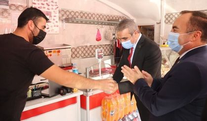 MHP’den esnafa destek ziyareti