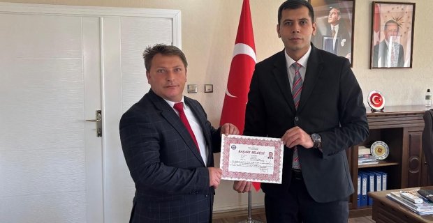 Kaymakam Akman’dan Orman İşletme Müdürü Kabaoğlu’na başarı belgesi
